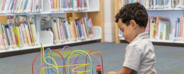 Child playing with toy