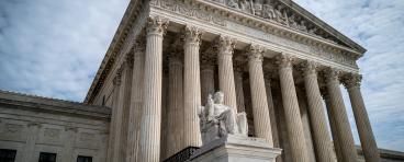 The US Supreme Court and cloudy sky
