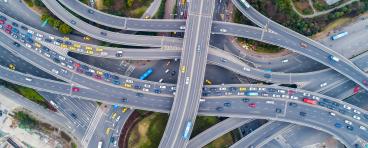 Cars drive on highways.