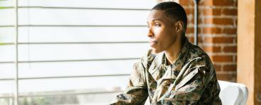 Solider sitting in folding chair