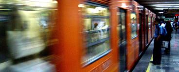 People wait for the subway in Mexico City.