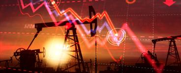 A graph of a market crash overlays a pumpjack.