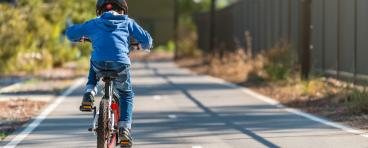 kid riding bike