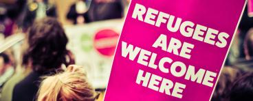 Refugees are welcome here protest sign