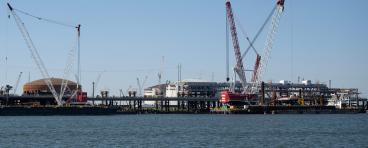Construction cranes are seen near the construction site of the Venture Global LNG plant in Plaquemines Parish south of New Orleans, Louisiana on October 17, 2023.