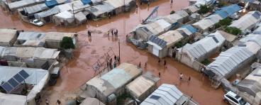 This aerial view shows the camp of Deir Ballut for internally displaced people in the Afrin region of Syria's rebel-held northern Aleppo province, inundated following heavy rainfall on May 24, 2024.