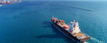  Aerial view container ship going to sea port for import export