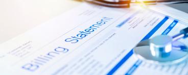  Health care billing statement with stethoscope 