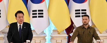 Ukrainian President Volodymyr Zelensky (R) and his South Korean counterpart Yoon Suk Yeol make statements following their talks in Kyiv on July 15, 2023.