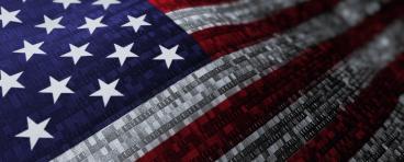 Waving national flag of the United States of America. Woven flag concept animation with digital binary numeric computer code running through the flag.