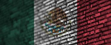 Digital code overlaid over Mexican flag