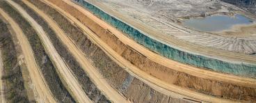  Aerial view of industrial terraces on mineral open pit mine.
