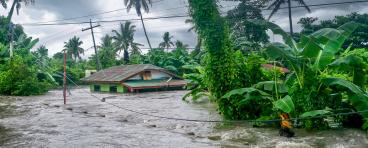 Rising water levels submerging a house as heavy monsoon rains cause major floods in Baco, Oriental Mindoro, Philippines on July 23, 2021.