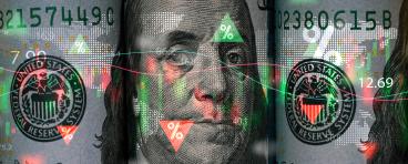 Benjamin Franklin face on USD dollar banknote with stock market chart and up down arrow for analysis investment.