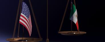 Scale holding Mexican and American flags