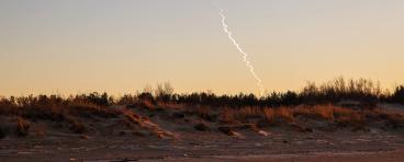 Missile trail in sky