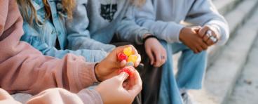 Children holding weed gummies