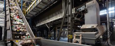 Plastics on conveyor belt for recycling