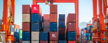 Shipping containers stacked on a cargo ship.