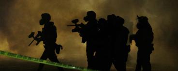 riot police amid smoke