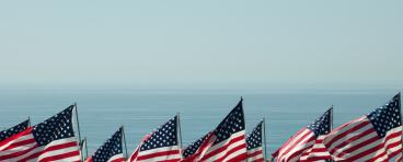 American flags on the sea background.