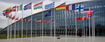 The national flags of countries member of the NATO fly outside the organisation headquarters in Brussels, Belgium on April 20 2023.