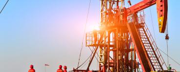 Field oil workers at work.
